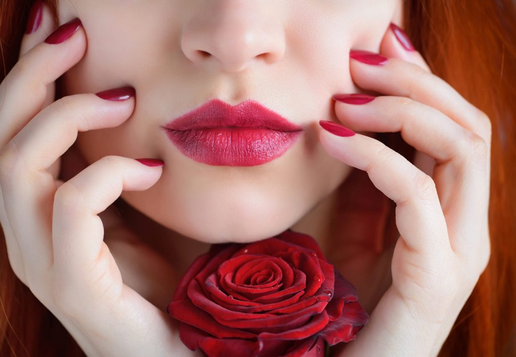 Breaking down lies about lip fillers - portrait with red rose flower dark red lips and na PTGX779 Botox Nottingham Dermal Fillers Beeston West_Bridgford Skin Tag Removal Wart Cheek Fillers Chesterfield Lincoln Leicester Beauty Skin Dermatology Treatments